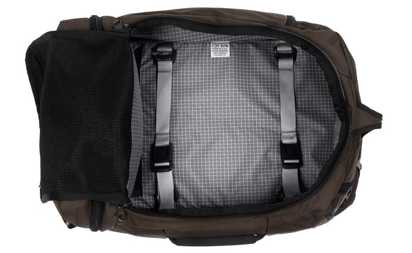 An open Techonaut 45 with a Ursa (brown) exterior and a Northwest Sky (grey) interior.